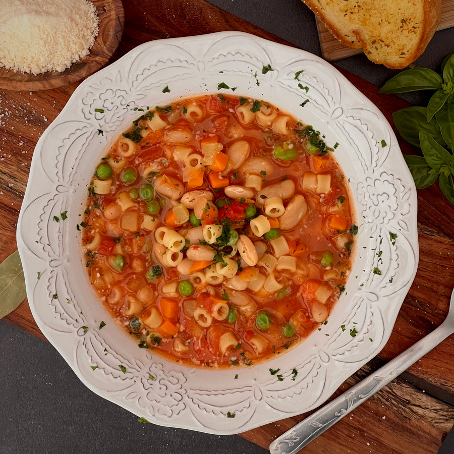 Pasta Fazool;Classic Italian-American soup lightened up with healthy vegetables explodes with healthy flavor. Tomatoes, garlic, onions, carrots, peas, cannellini beans and pasta simmered in vegetable broth is the ultimate bowl of comfort food.