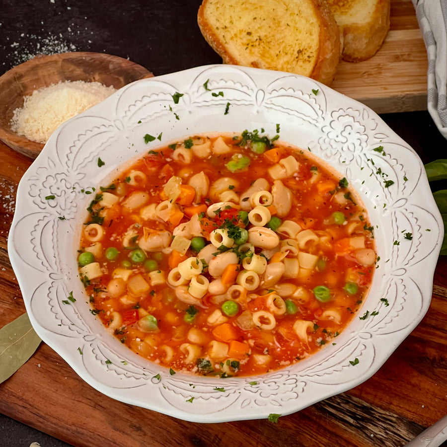 Pasta Fazool;Classic Italian-American soup lightened up with healthy vegetables explodes with healthy flavor. Tomatoes, garlic, onions, carrots, peas, cannellini beans and pasta simmered in vegetable broth is the ultimate bowl of comfort food.