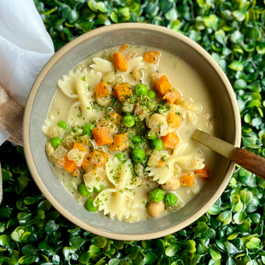 Chickpeas and Noodle Soup: Broth, steamy, and satisfying comfort soup of succulent chickpeas, chewy noodles, slowly simmered in vegetable broth with carrots and celery, rosemary and thyme.